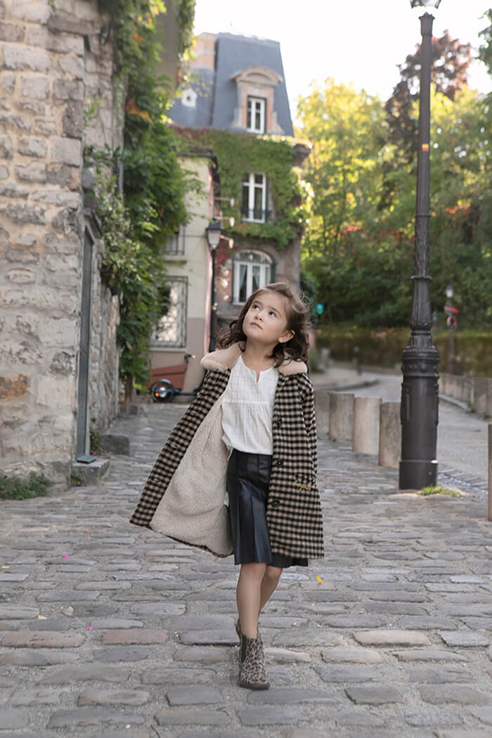 little girl strolling in Montmartre